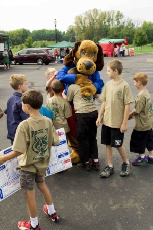 dollar dog hugging boy scout troop