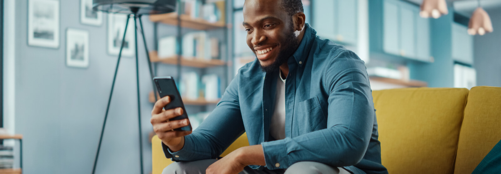 Young man holding a smartphone