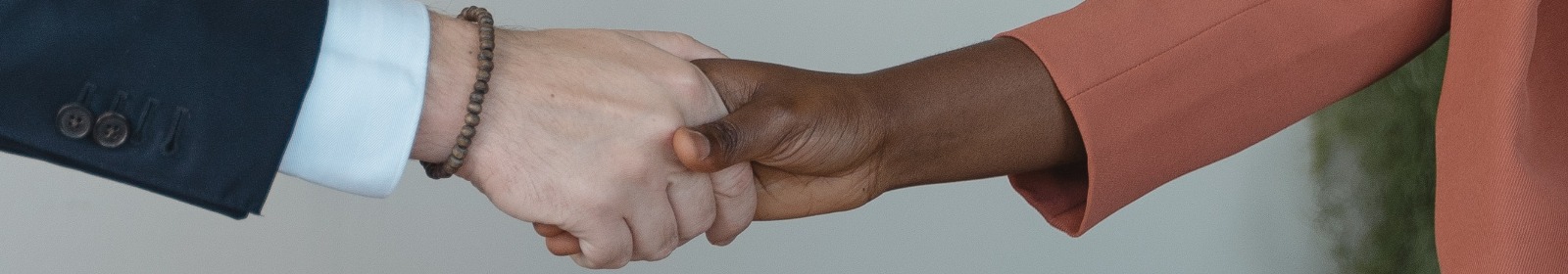 man and woman shaking hands