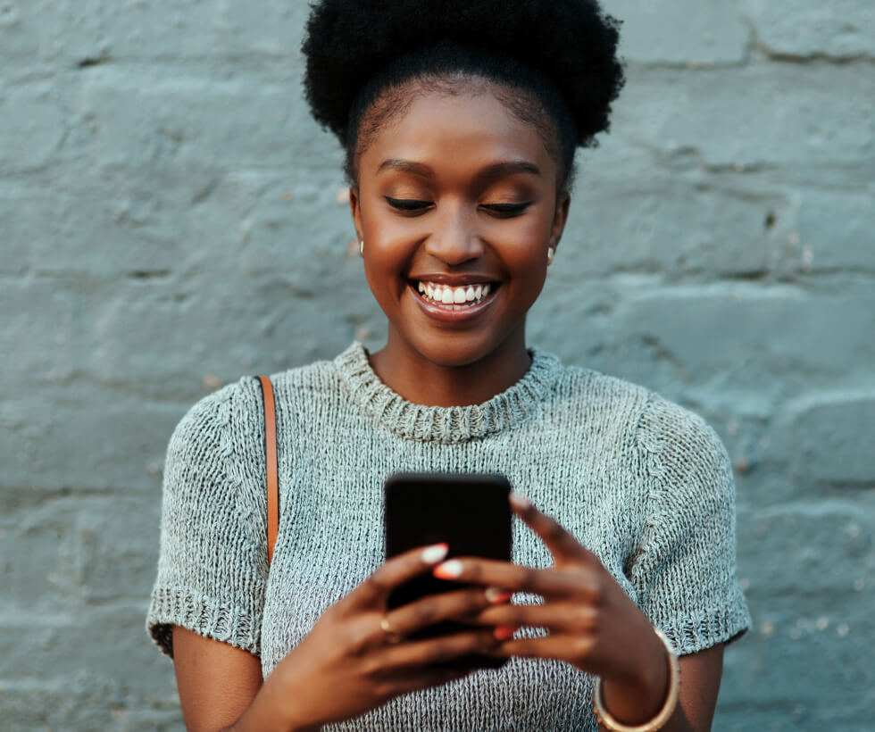 Young woman holding a smartphone