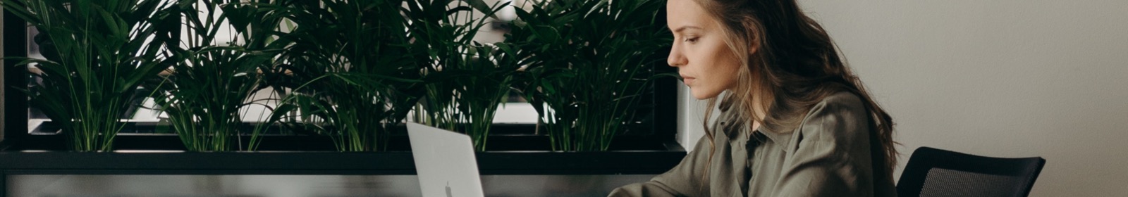 young adult woman on laptop